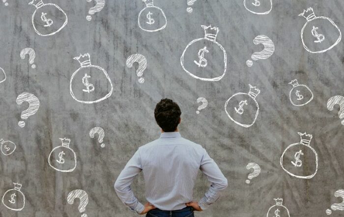 man trying to decide about money